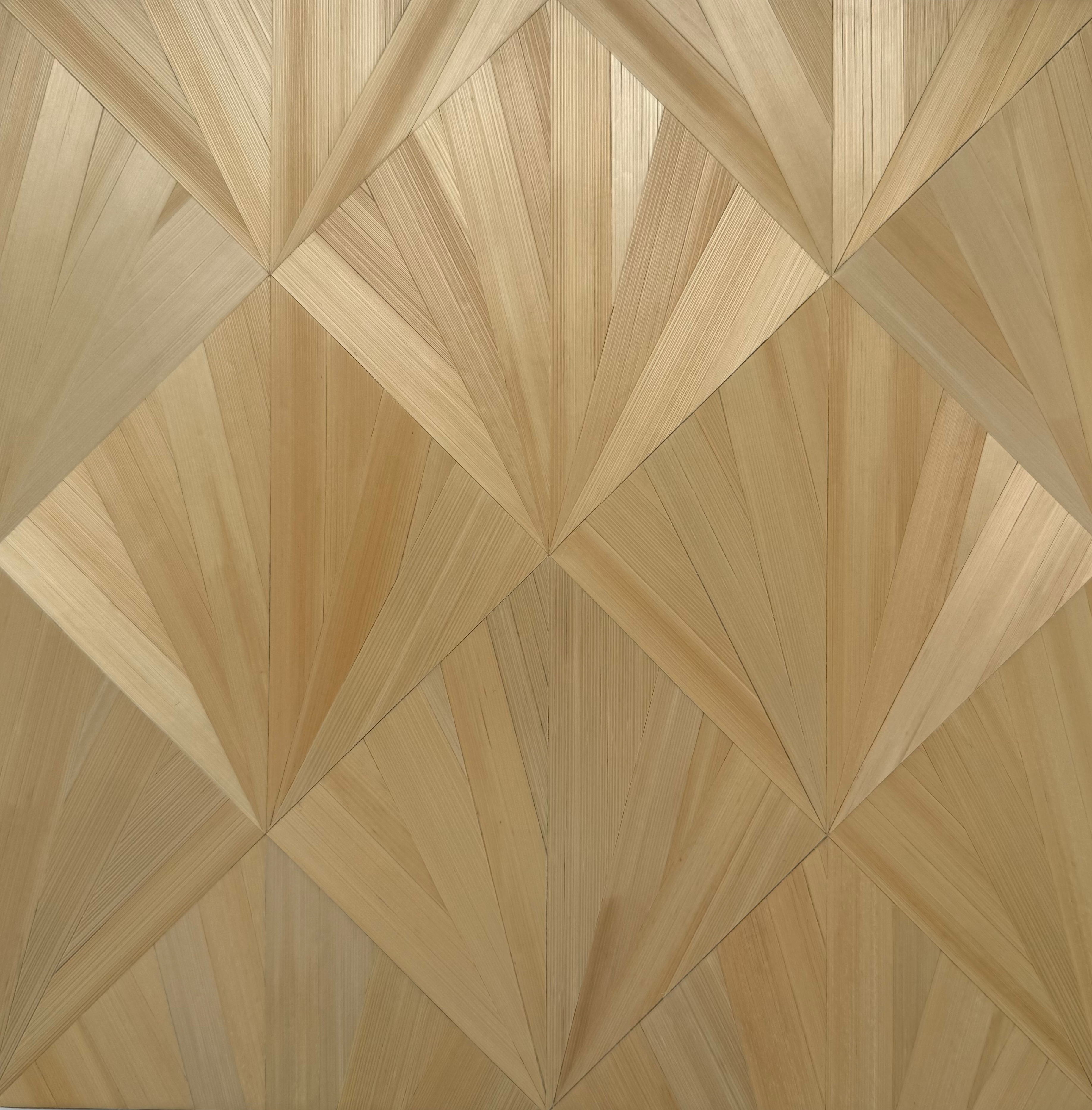 Cecile Ancelin working with prepared straw materials in her studio